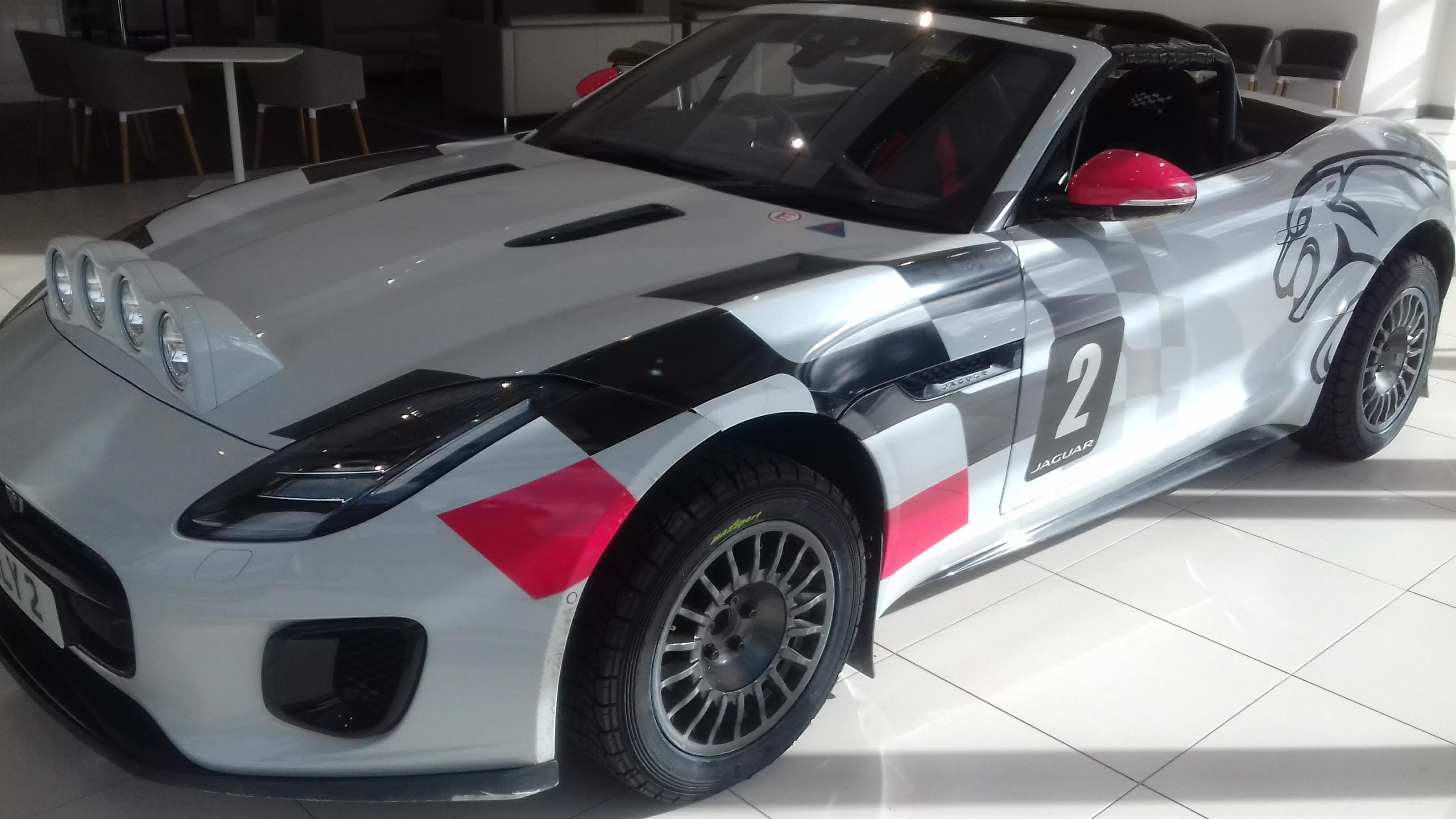 Jaguar rally car side and bonnet view
